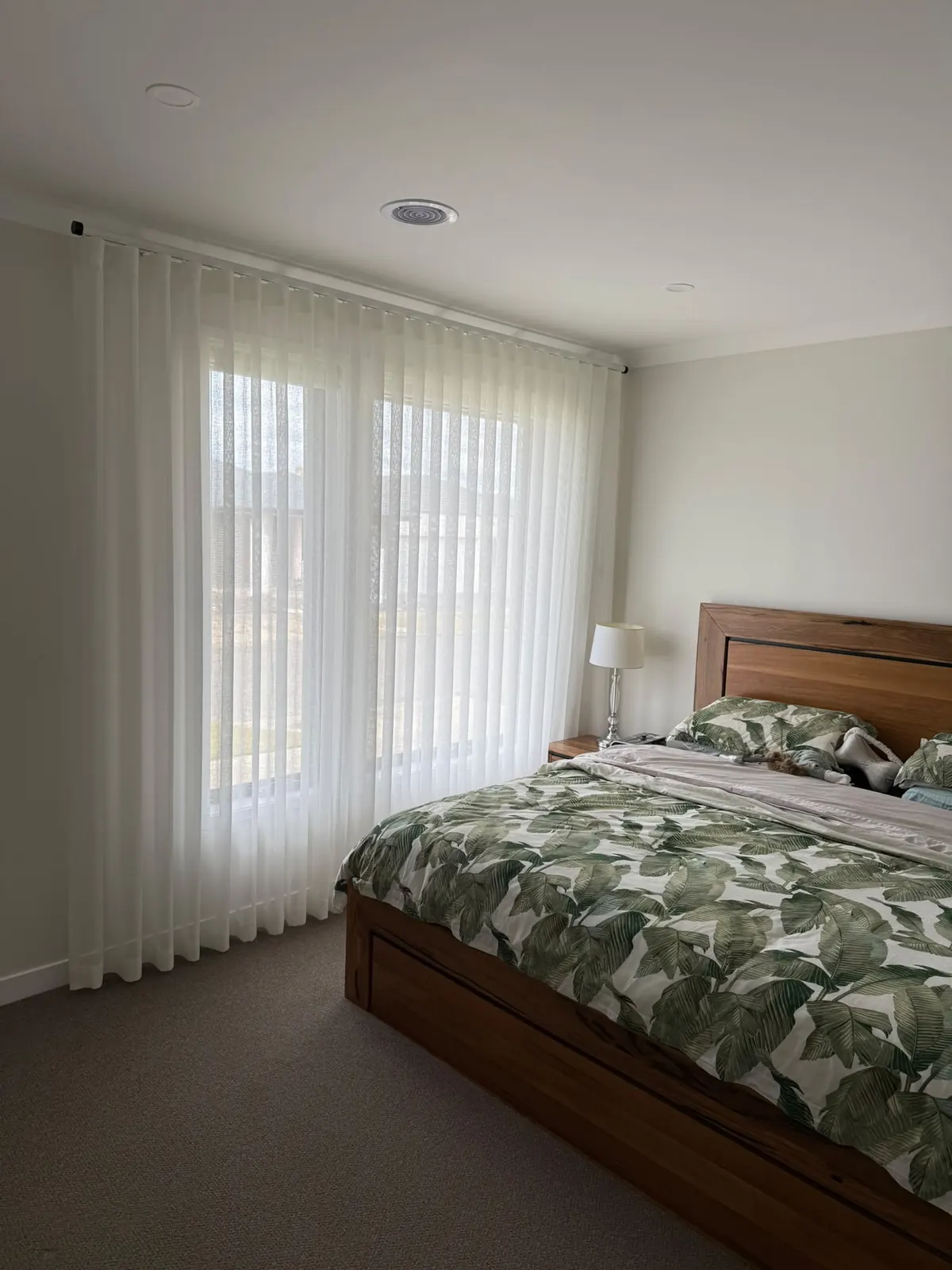 Curtains beside a bedroom window