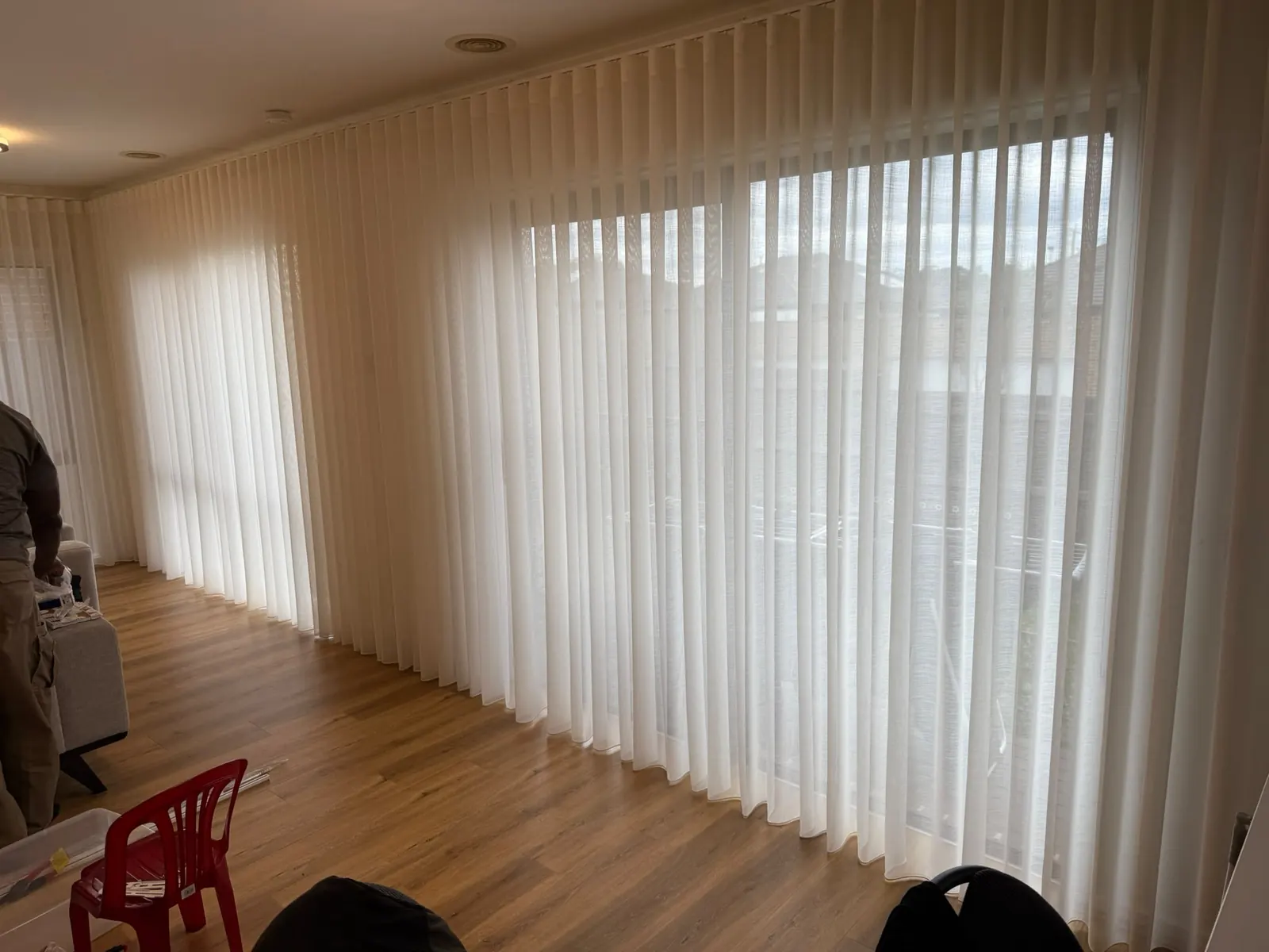 Curtains across a large window